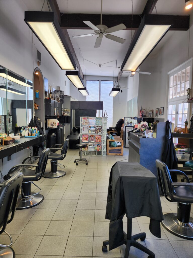 Bright modern hair salon interior with chairs